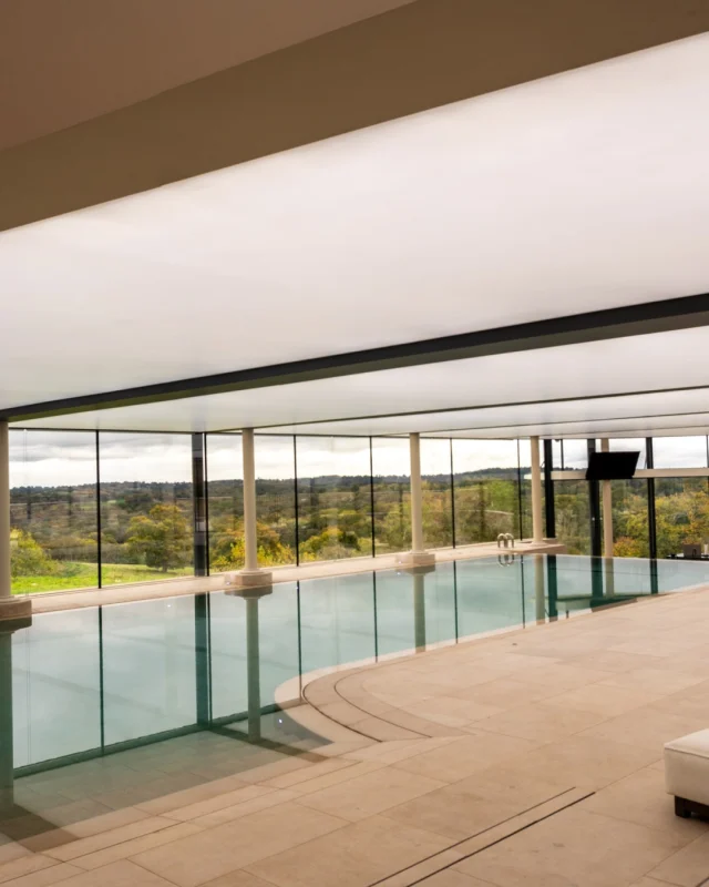 Tunbridge Wells Project Highlight

This 14.3m indoor residential swimming pool in Tunbridge Wells features a deck-level system with a striking infinity edge and dual-sided perimeter overflow, creating a seamless transition between the water and the surrounding architecture. The clean rectangular design is complemented by a dedicated step bay, balancing contemporary aesthetics with everyday functionality.

Discover the full project in the link our bio.

#PoolDesign #Poolbuild #WellnessDesign #Guncast